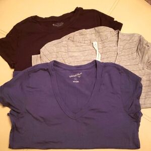 Three t-shirts, Lululemon (sz 2), Athleta (sz xxs), Universal Thread (sz xs)